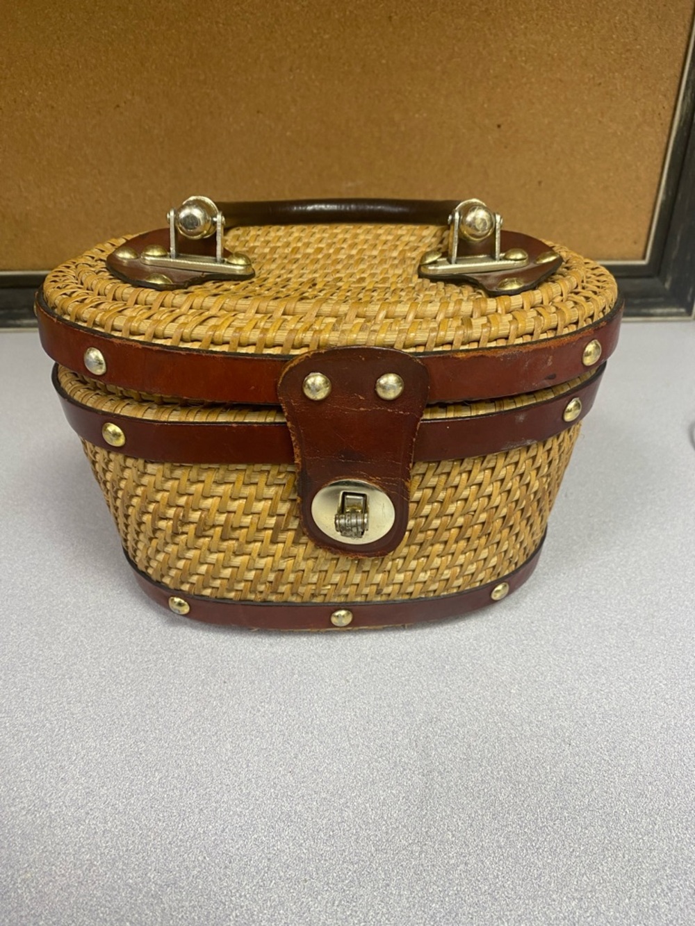 Simon’s Vtg. Woven Straw basket bag with Brown Trim and Gold Hardware